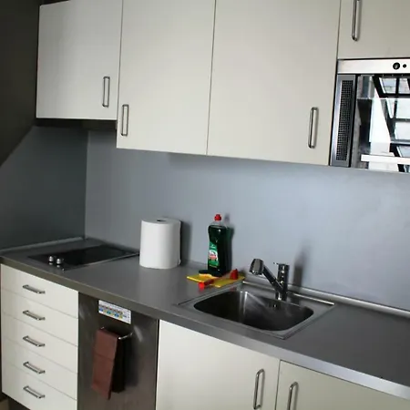 Cinc Balcons شقة
